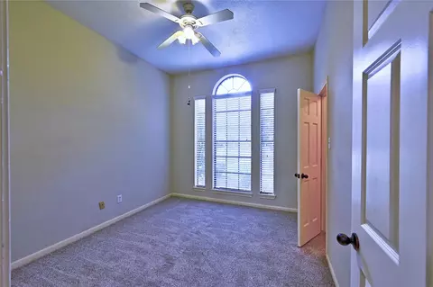 Bedroom - 6018 Spring Creek Ln, Spring, TX 77379 photo 4 of 6