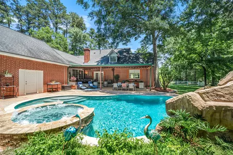 Exterior - 403 Westbrook St, Pinehurst, TX 77362 photo 8 of 16