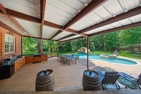 Exterior - 403 Westbrook St, Pinehurst, TX 77362 photo 6 of 16
