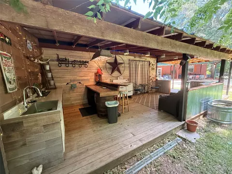 Exterior - 403 Westbrook St, Pinehurst, TX 77362 photo 12 of 16