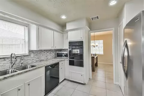 Kitchen - 9614 Ballin David Dr, Spring, TX 77379 photo 2 of 5