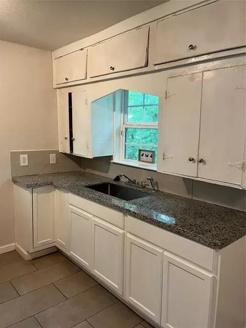 Kitchen - 7227 Saint Augustine St, Houston, TX 77021 photo 1 of 2