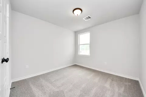 Bedroom - 18720 Loom Dr, Conroe, TX 77306 photo 9 of 12