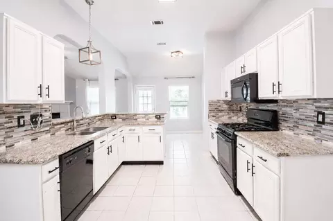 Kitchen - 303 Burris Park Dr, Spring, TX 77373 photo 4 of 4