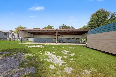 Exterior - 149 E Austin Ave, Onalaska, TX 77360 photo 10 of 12