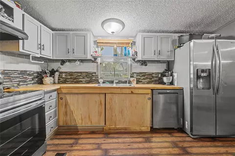 Kitchen - 149 E Austin Ave, Onalaska, TX 77360 photo 2 of 3