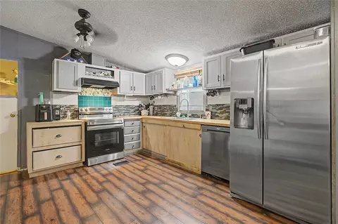 Kitchen - 149 E Austin Ave, Onalaska, TX 77360 photo 1 of 3