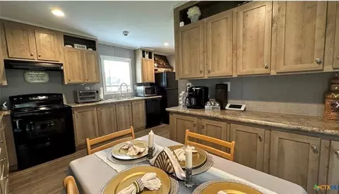 Kitchen - 112 E Toledo St, Seadrift, TX 77983 photo 2 of 3