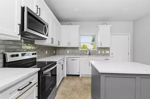 Kitchen - 300 Pine St, Forney, TX 75126 photo 3 of 4