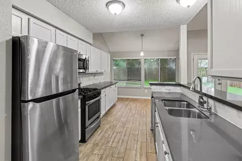 Kitchen - 24103 Spring Sunset Dr, Spring, TX 77373 photo 1 of 2