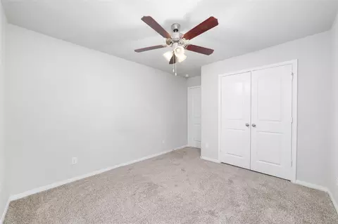 Bedroom - 4830 Creekside Haven Trl, Spring, TX 77389 photo 5 of 9