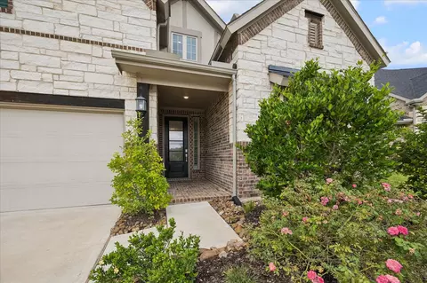 Exterior - 504 Sage Timbers Ln, Pinehurst, TX 77362 photo 2 of 4