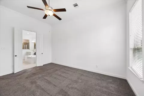 Bedroom - 504 Sage Timbers Ln, Pinehurst, TX 77362 photo 2 of 6