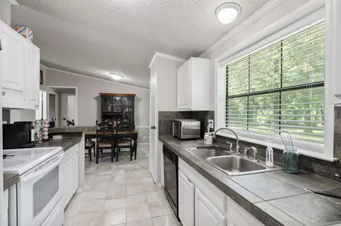 Kitchen - 11291 Darby Loop # -3, Conroe, TX 77385 photo 8 of 8