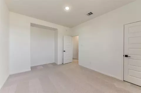 Bedroom - 4221 Red Cedar Ring Ln, Pinehurst, TX 77362 photo 6 of 9