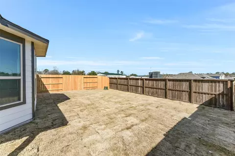 Exterior - 4221 Red Cedar Ring Ln, Pinehurst, TX 77362 photo 6 of 7