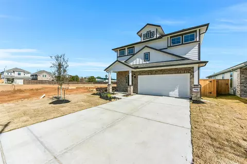 Exterior - 4221 Red Cedar Ring Ln, Pinehurst, TX 77362 photo 2 of 7