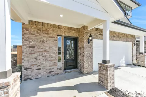 Exterior - 4221 Red Cedar Ring Ln, Pinehurst, TX 77362 photo 3 of 7