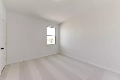 Bedroom - 4221 Red Cedar Ring Ln, Pinehurst, TX 77362 photo 5 of 9