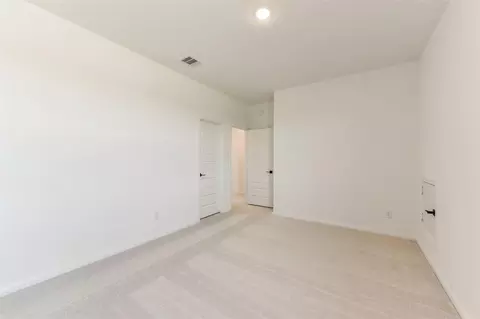Bedroom - 4221 Red Cedar Ring Ln, Pinehurst, TX 77362 photo 4 of 9