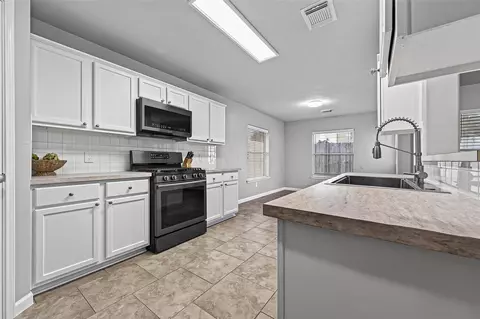 Kitchen - 21715 Texian Ct, Spring, TX 77388 photo 2 of 6