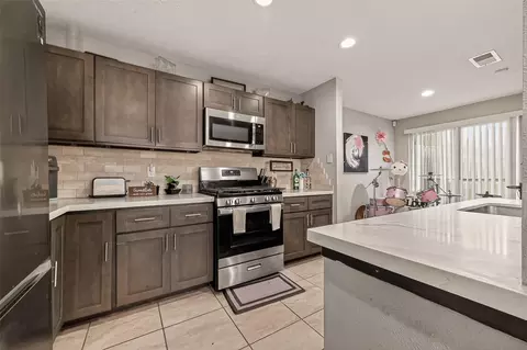 Kitchen - 2519 Spring Dusk Ln, Spring, TX 77373 photo 2 of 6