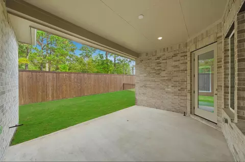 Exterior - 10026 Larkin Cv, Willis, TX 77318 photo 4 of 7