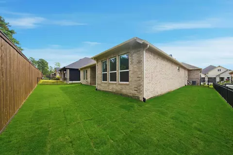 Exterior - 10026 Larkin Cv, Willis, TX 77318 photo 3 of 7