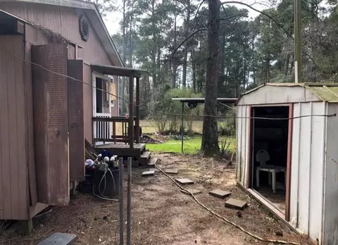 Exterior - 204 Kangaroo, Onalaska, TX 77360 photo 6 of 7
