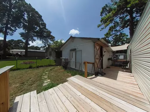 Exterior - 152 E Oak Shadows, Onalaska, TX 77360 photo 3 of 5