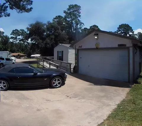 Exterior - 152 E Oak Shadows, Onalaska, TX 77360 photo 1 of 5
