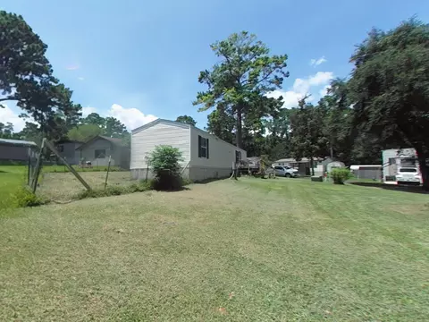 Exterior - 152 E Oak Shadows, Onalaska, TX 77360 photo 2 of 5
