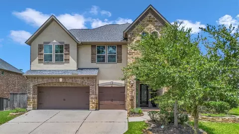206 Chirping Squirrel Ct, Pinehurst, TX 77362 photo 1