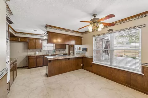 Kitchen - 322 Enchanted River Dr, Spring, TX 77388 photo 3 of 4