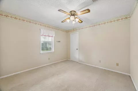 Bedroom - 322 Enchanted River Dr, Spring, TX 77388 photo 2 of 4