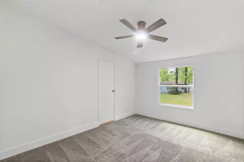 Bedroom - 13488 Enchanted Cv, Willis, TX 77318 photo 4 of 7