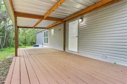 Exterior - 13488 Enchanted Cv, Willis, TX 77318 photo 4 of 7