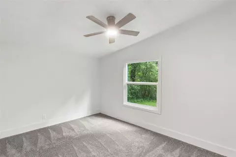 Bedroom - 13488 Enchanted Cv, Willis, TX 77318 photo 6 of 7