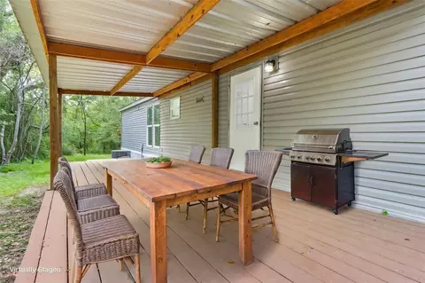 Exterior - 13488 Enchanted Cv, Willis, TX 77318 photo 5 of 7