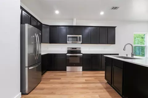 Kitchen - 14390 Half Circle St, Splendora, TX 77372 photo 2 of 3