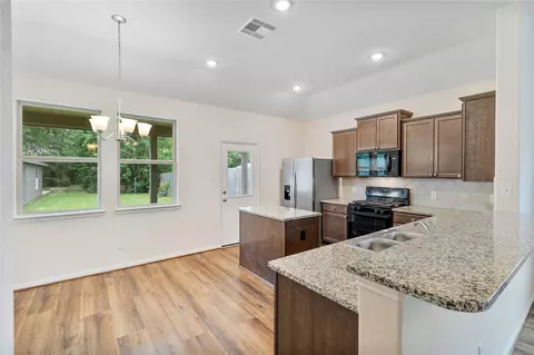 Kitchen - 426 Kickapoo Dr, Anahuac, TX 77514 photo 1 of 2