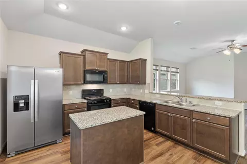 Kitchen - 426 Kickapoo Dr, Anahuac, TX 77514 photo 2 of 2