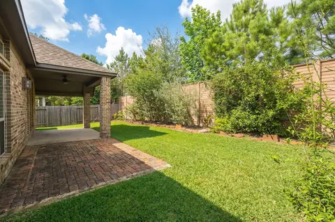 Exterior - 209 Trillium Park Loop, Conroe, TX 77304 photo 6 of 10