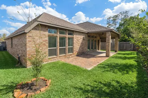 Exterior - 209 Trillium Park Loop, Conroe, TX 77304 photo 5 of 10