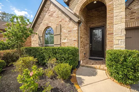 Exterior - 209 Trillium Park Loop, Conroe, TX 77304 photo 4 of 10