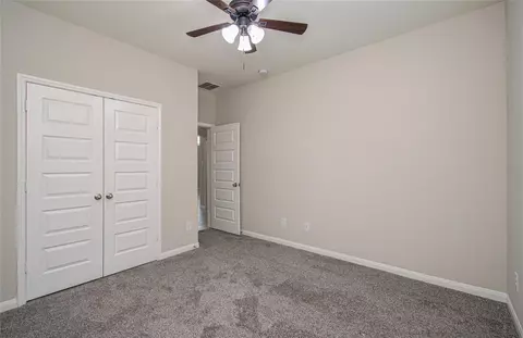 Bedroom - 22207 Warm Terrace Ln, Spring, TX 77389 photo 8 of 9
