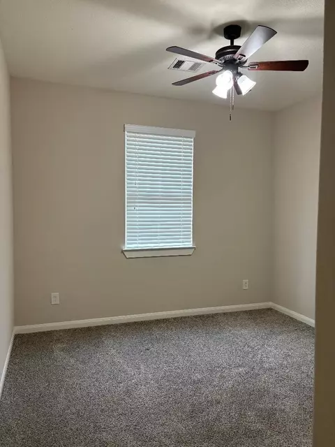 Bedroom - 22207 Warm Terrace Ln, Spring, TX 77389 photo 2 of 9