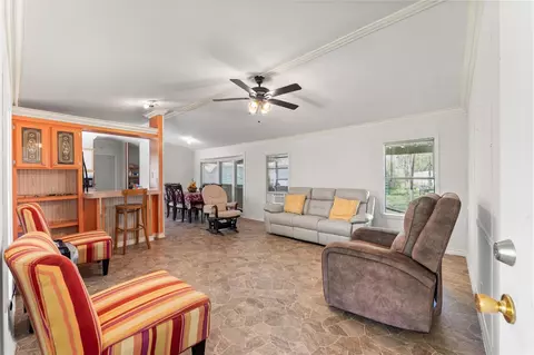 Living - 606 S Pine Hill St, Pinehurst, TX 77362 photo 1 of 2
