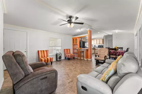 Living - 606 S Pine Hill St, Pinehurst, TX 77362 photo 2 of 2