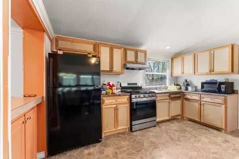 Kitchen - 606 S Pine Hill St, Pinehurst, TX 77362 photo 1 of 1